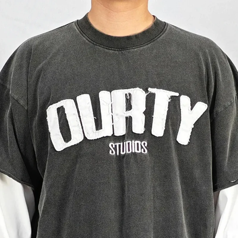 A2106b21d148546248b75baded36ebc16D.webp Distressed Embroidery Double Layer Long Sleeve Graphic Shirt